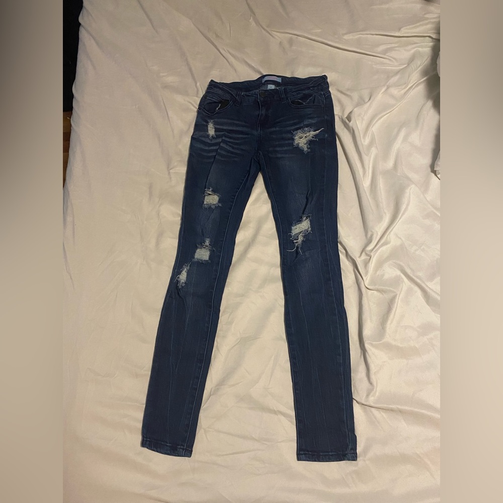 Ripped dark jeans